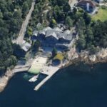 Norge: Mångmiljonären och fastighetsentreprenören Bjørn Hanevik har beordrats att avlägsna illegala kajer och ett garage från sin fastighet i idylliska Åsane i Bergen